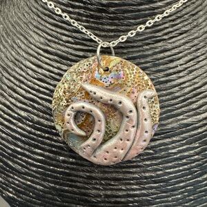 Artistic Silver and Gold Pendant Necklace